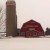 Photo of a red barn and silo in the snow