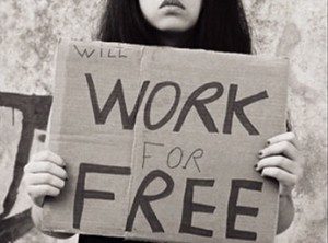 Cardboard sign saying "Will Work for Free"