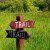 Trail sign pointing in two different directions