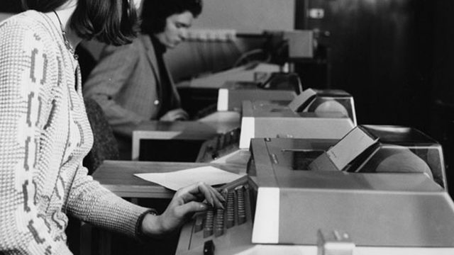 Women at typewriters