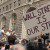 Protest with sign saying "Wall Street is Our Street"