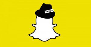 The Snapchat ghost wearing a press hat