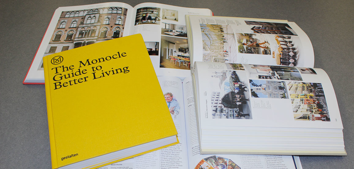 Monocle magazines laid out on a table.