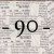 "90" with background of newspapers