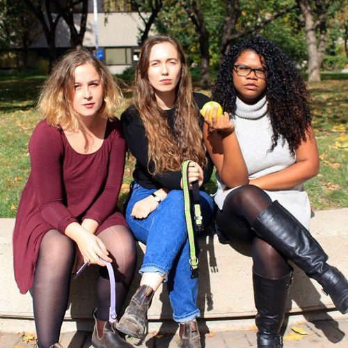 Offleash Podcast hosts sitting on campus