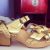 Gold high heels sandals