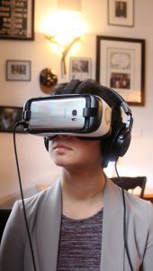 A person wears VR devices