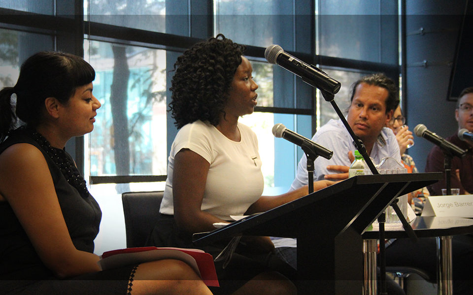 Vicky Mochama speaking at a conference