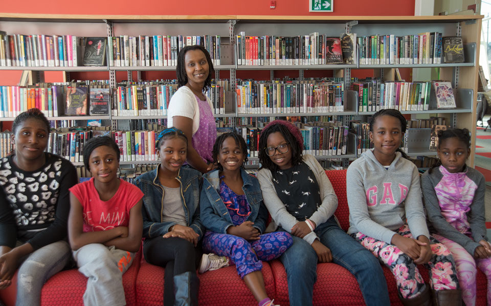 Annette Bazira-Okafor (back) with some of the girls from Black Girls Magazine.