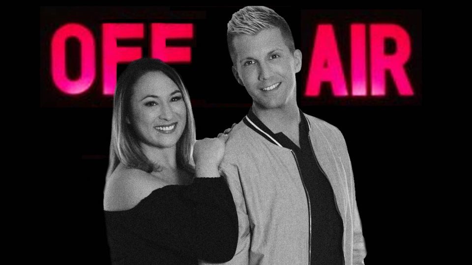 Radio hosts Jesse and Jenna stand in front of a neon "Off Air" sign