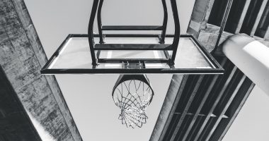 A black and white photo of a basketball hoop
