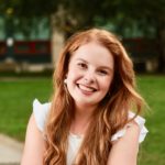 Mid shot of a woman smiling towards the camera